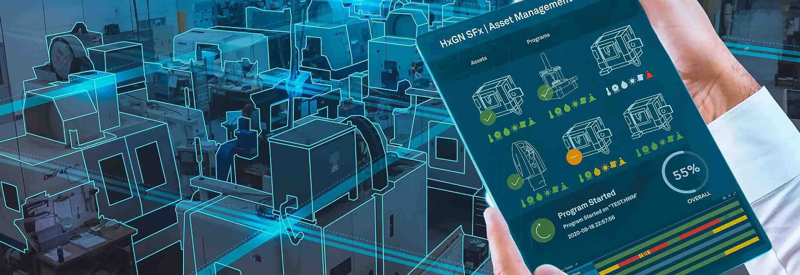 显示生产资产管理仪表板的平板设备，监控车间的机床